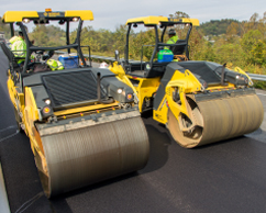 Two BOMAG asphalt rollers