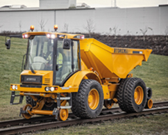 Hydrema dump truck on rail wheels