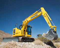 Komatsu excavator digging dirt