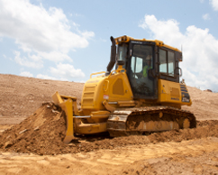 Komatsu dozer pushing dirt